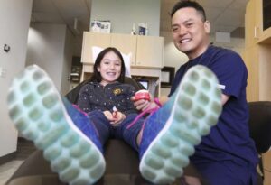 Friendly Dentist San Ramon 1 Dr. Anthony Nguyen smiling with a young child patient during a friendly dental visit at Pro Smile Dental Care